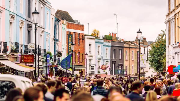 Crowded street at Portobello Road Market in Notting Hill, London, UK.